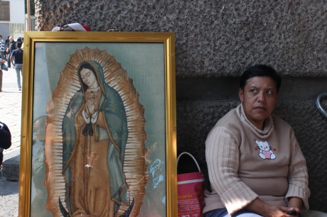 6.Disabled women with her Virgin of Guadalupe, outside the Basilica, Mexico City, by Andrés Brayan.